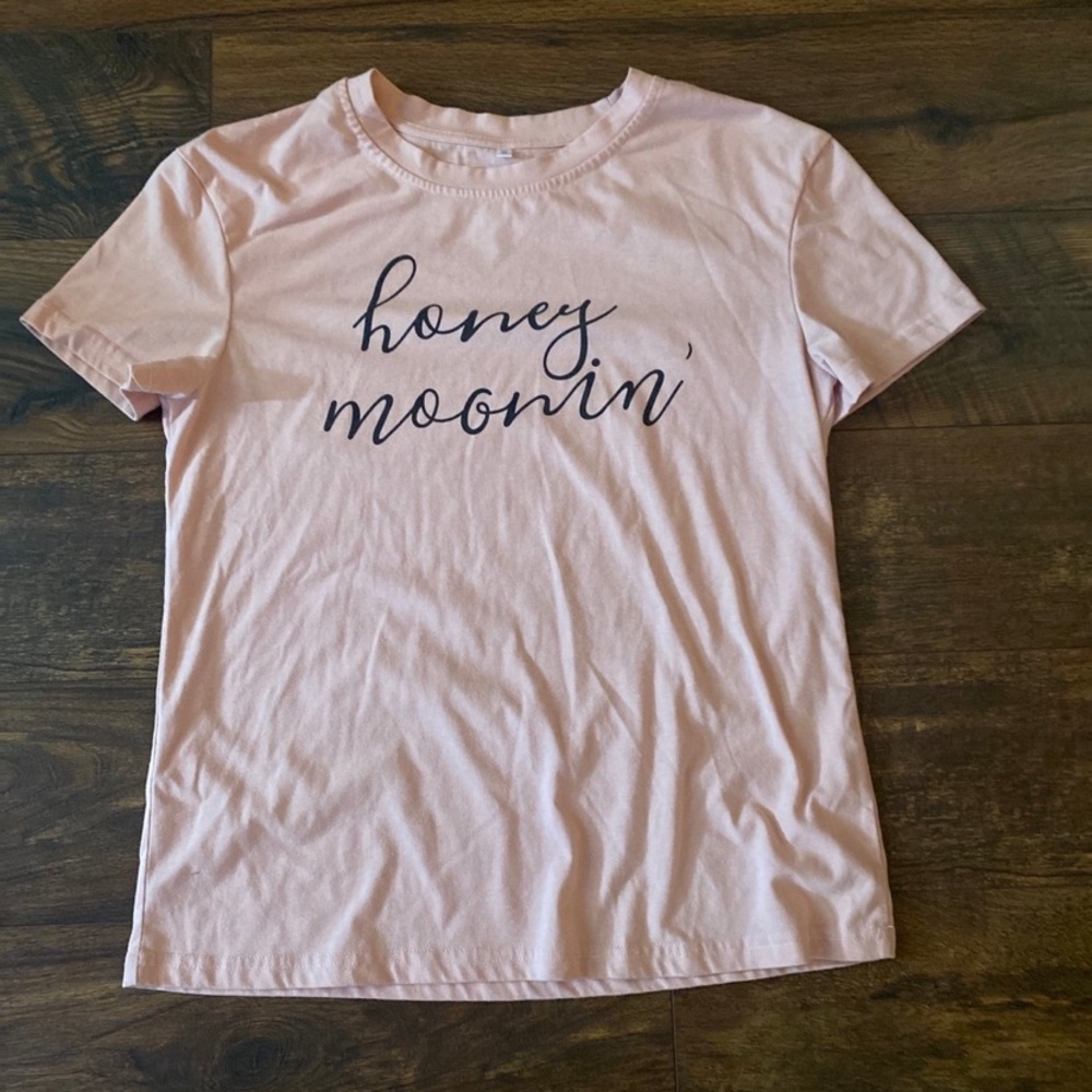 Men’s large and women’s small honeymooning shirts. Perfect for newly weds.